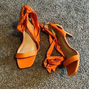 Orange wrap around the ankle heels